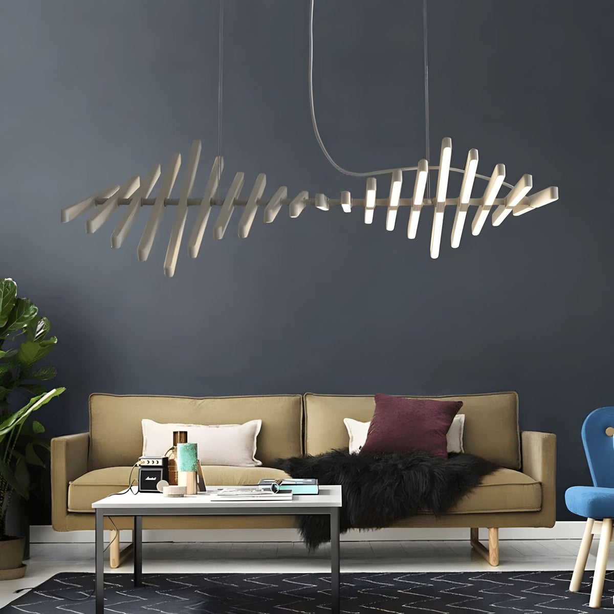 Talia pendant above a sofa in a dark living room