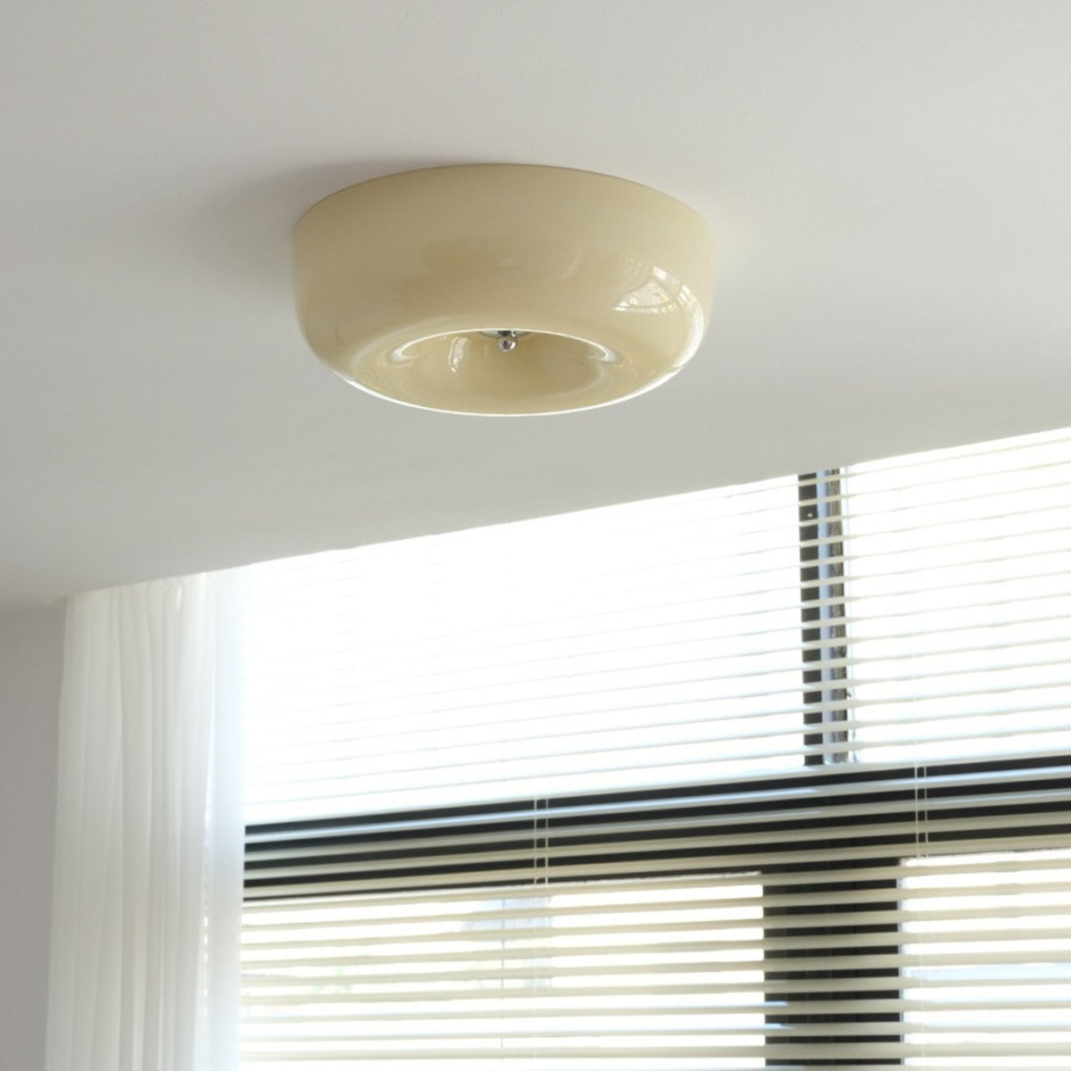 Tsubaki ceiling light by a window with blinds