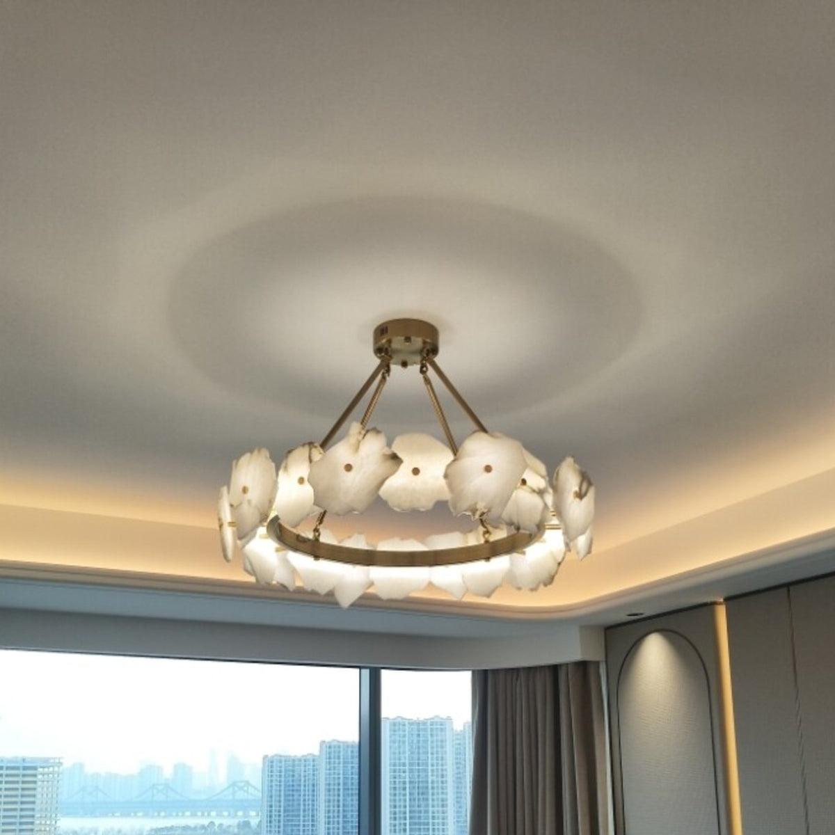 Customer photo of the Isola alabaster chandelier in a living room