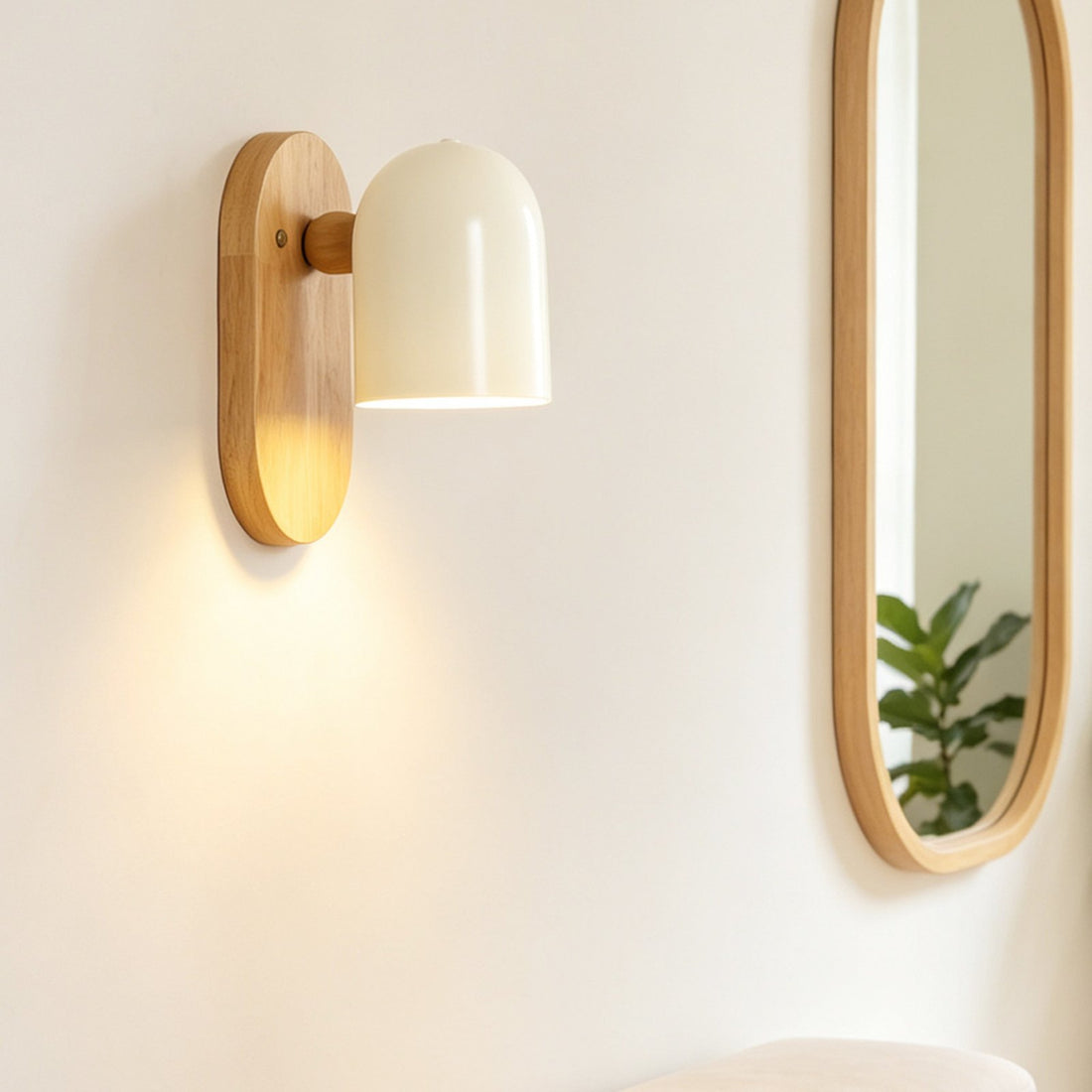 Kodama wall light beside a mirror