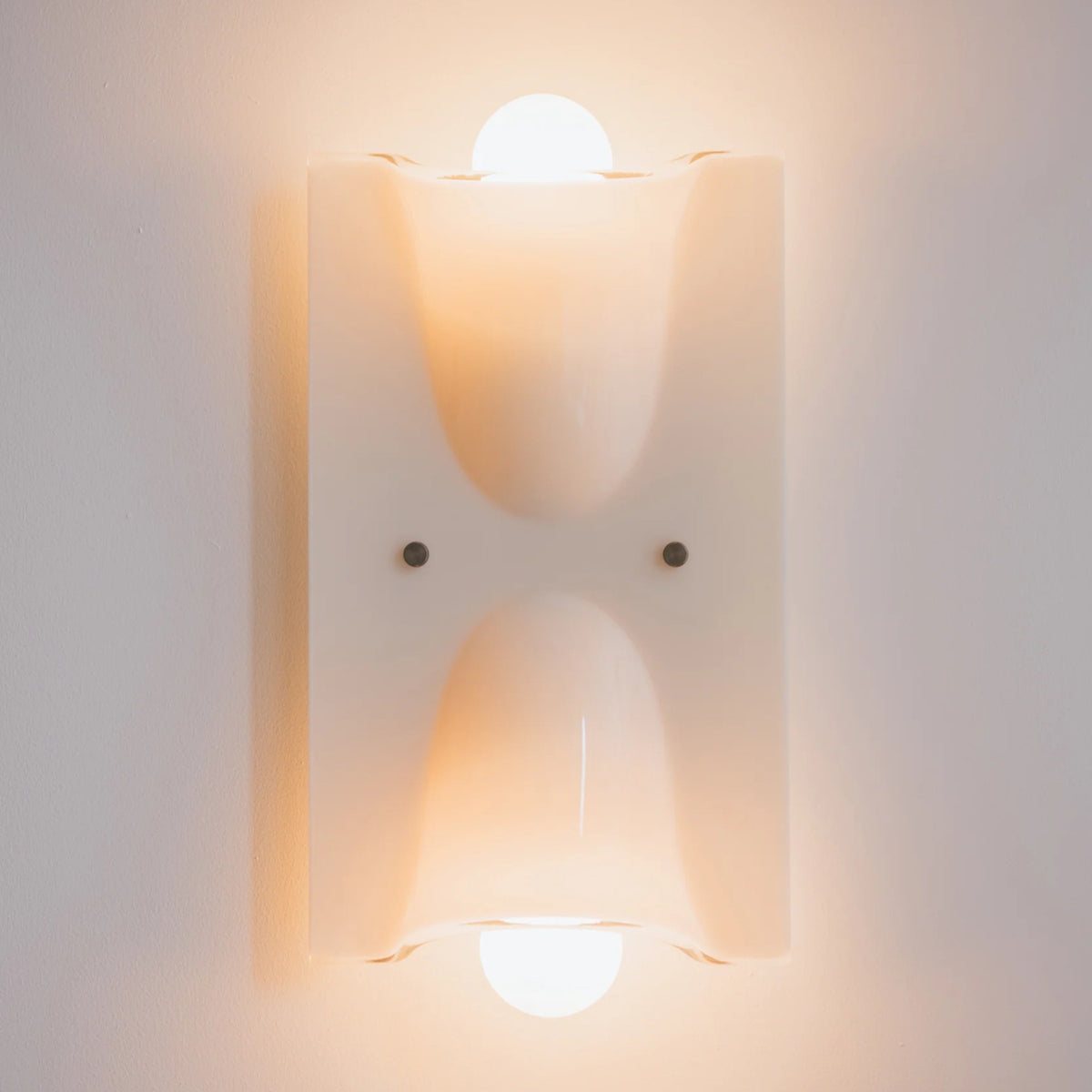 Linnea cream double head wall light glowing warm