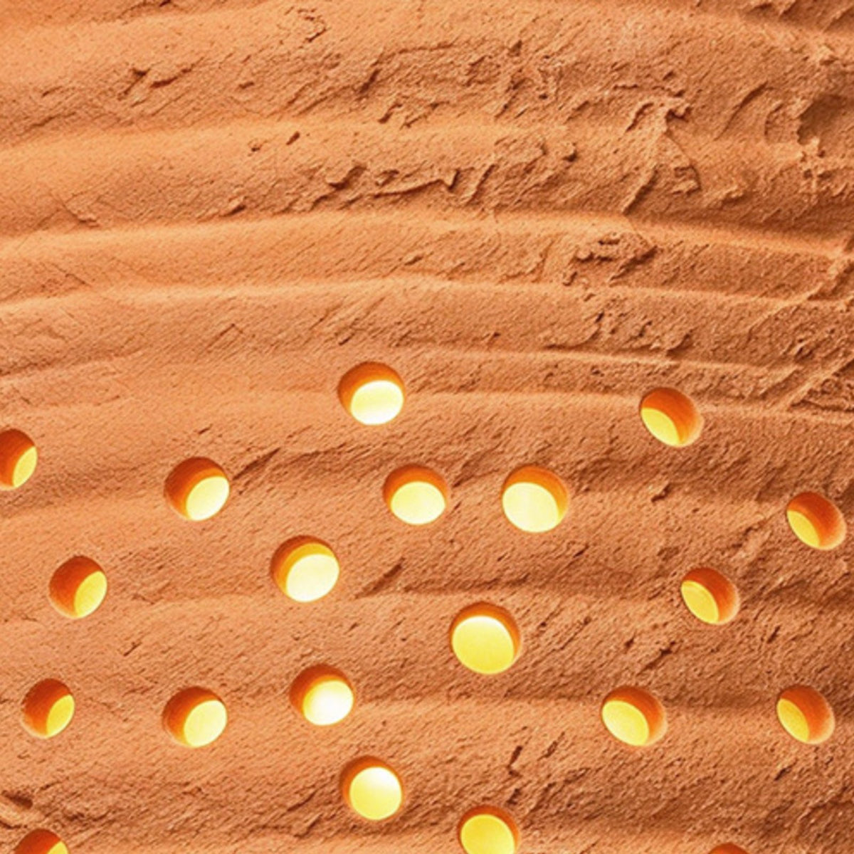 Light glowing through perforated terracotta