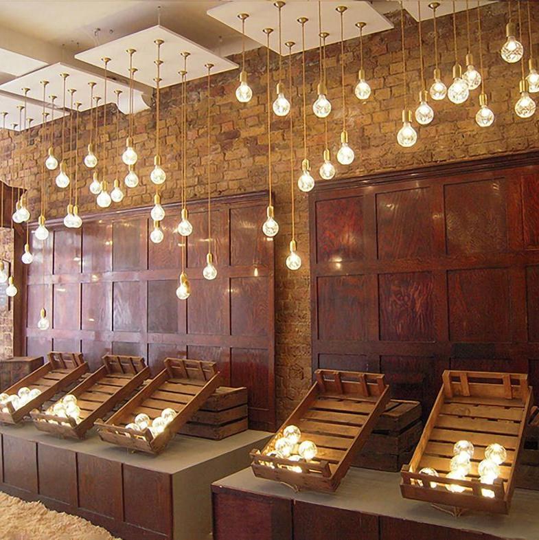 Lampada a sospensione con bulbo di cristallo in design nordico