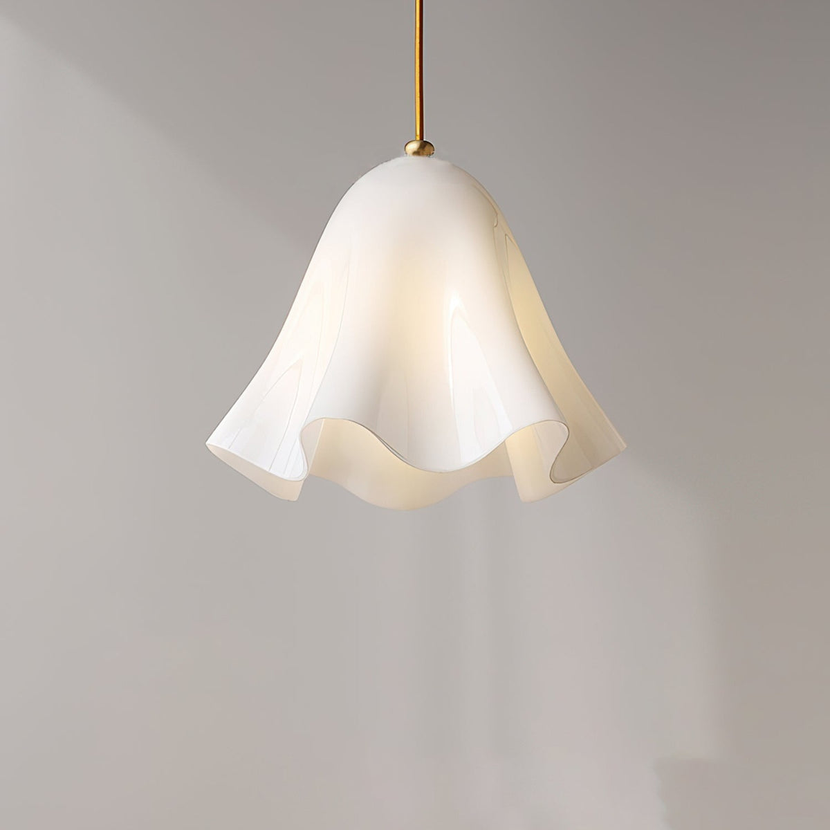 White glass skirt pendant light lit