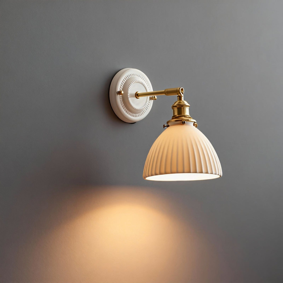 Suzu fluted bell wall light switched on