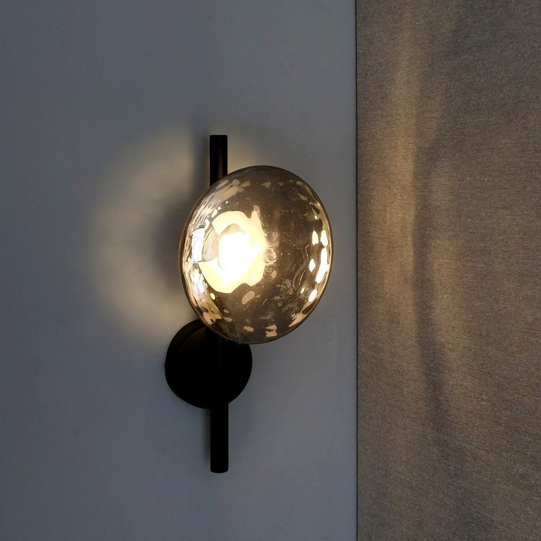 Tranquil Reflections, Sculpted in Light: The Nordic Round Ceto Glass Wall Light by Hugbel