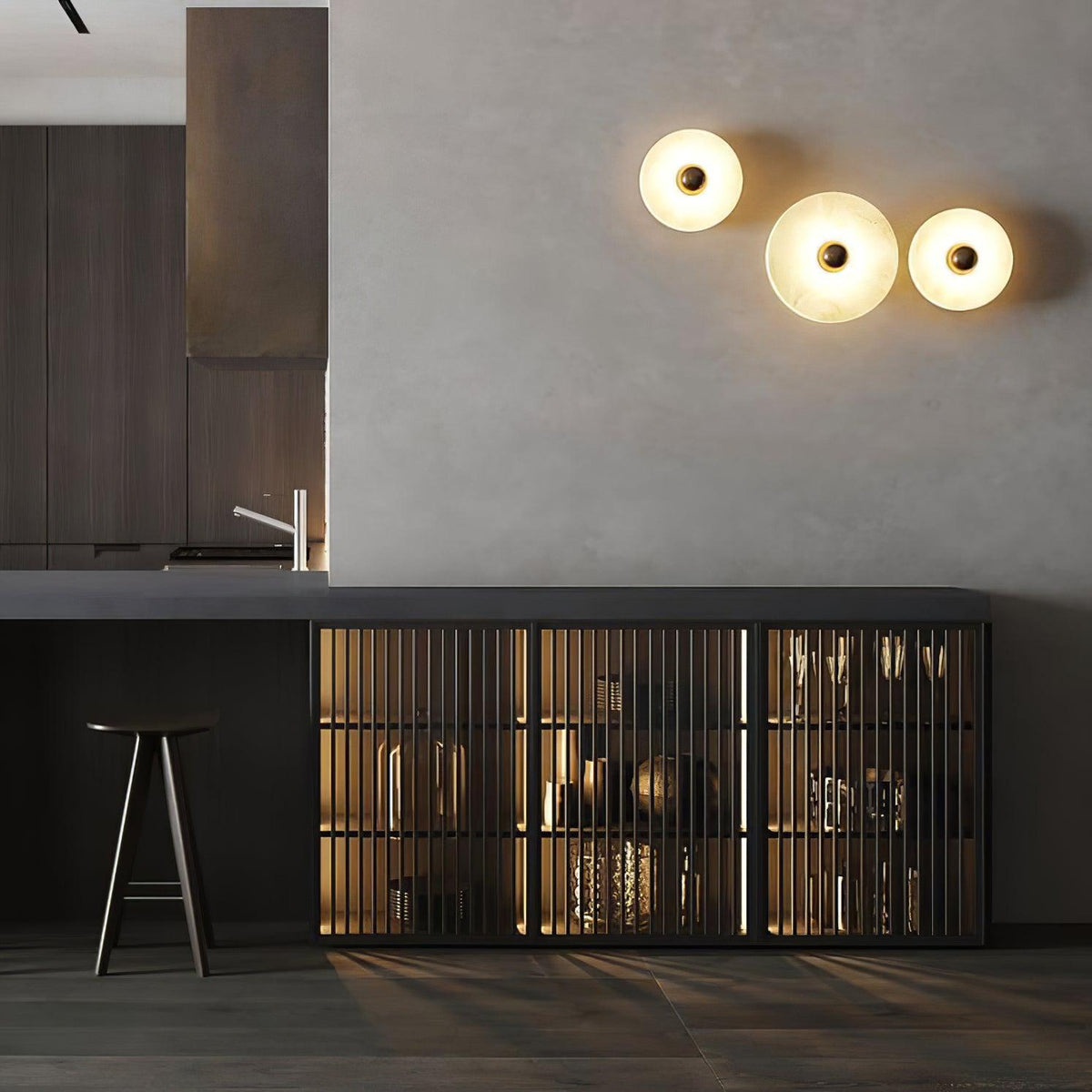 Alabaster wall lights above a kitchen bar with stools