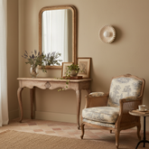 Himawari cream ceramic wall light above a console table in a vintage hallway