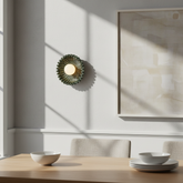 Himawari Indian green ceramic wall light in a dining room