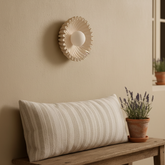 Himawari cream ceramic wall light above a timber bench with a linen cushion