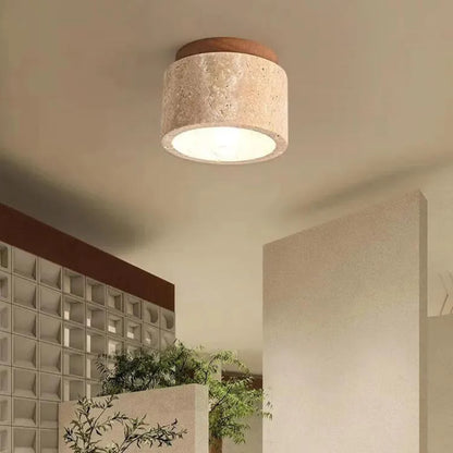 Le luminaire de plafond en travertin