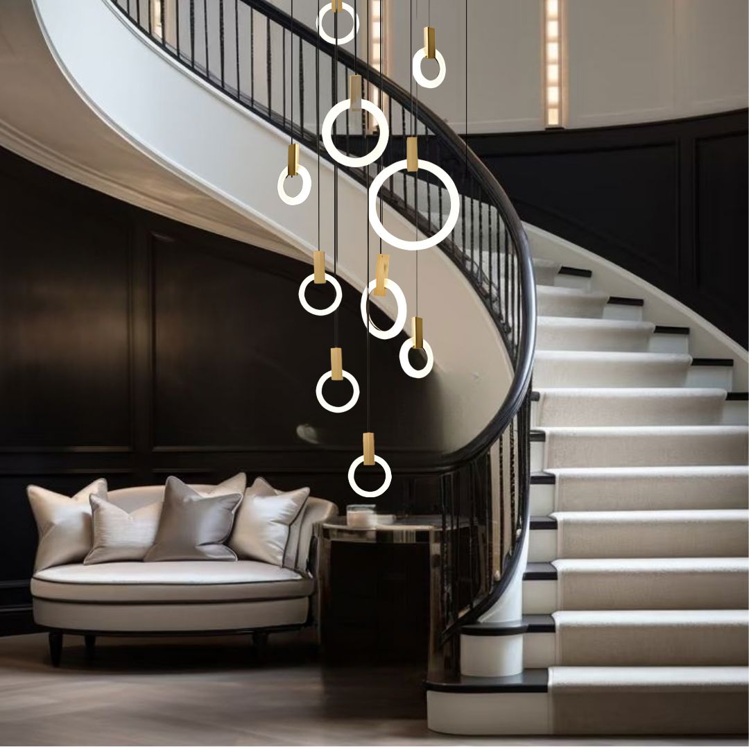 Ylva ring chandelier in a curved staircase