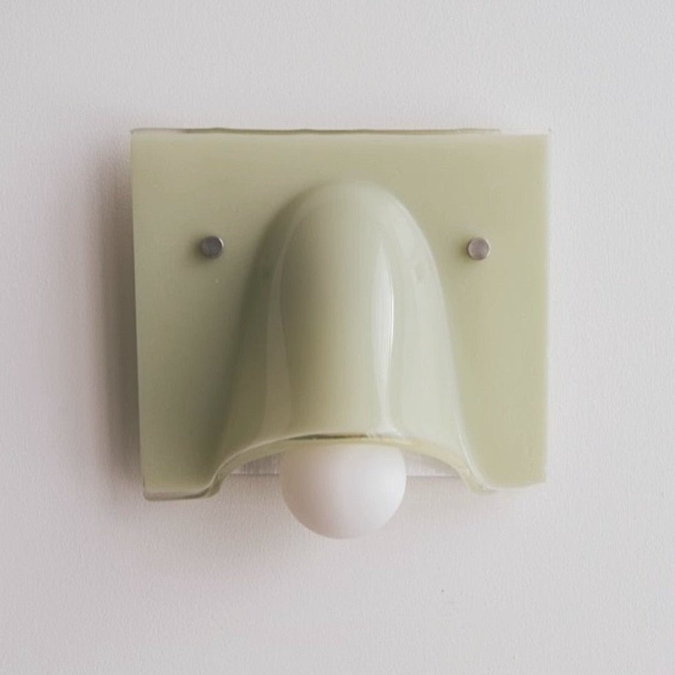 Linnea sage single head wall light on a white wall