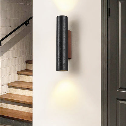 Lampe murale tube en travertin noir minimaliste