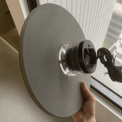 Lámpara de pared de terrazo en forma de disco