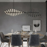 Talia pendant in a dining room with grey chairs