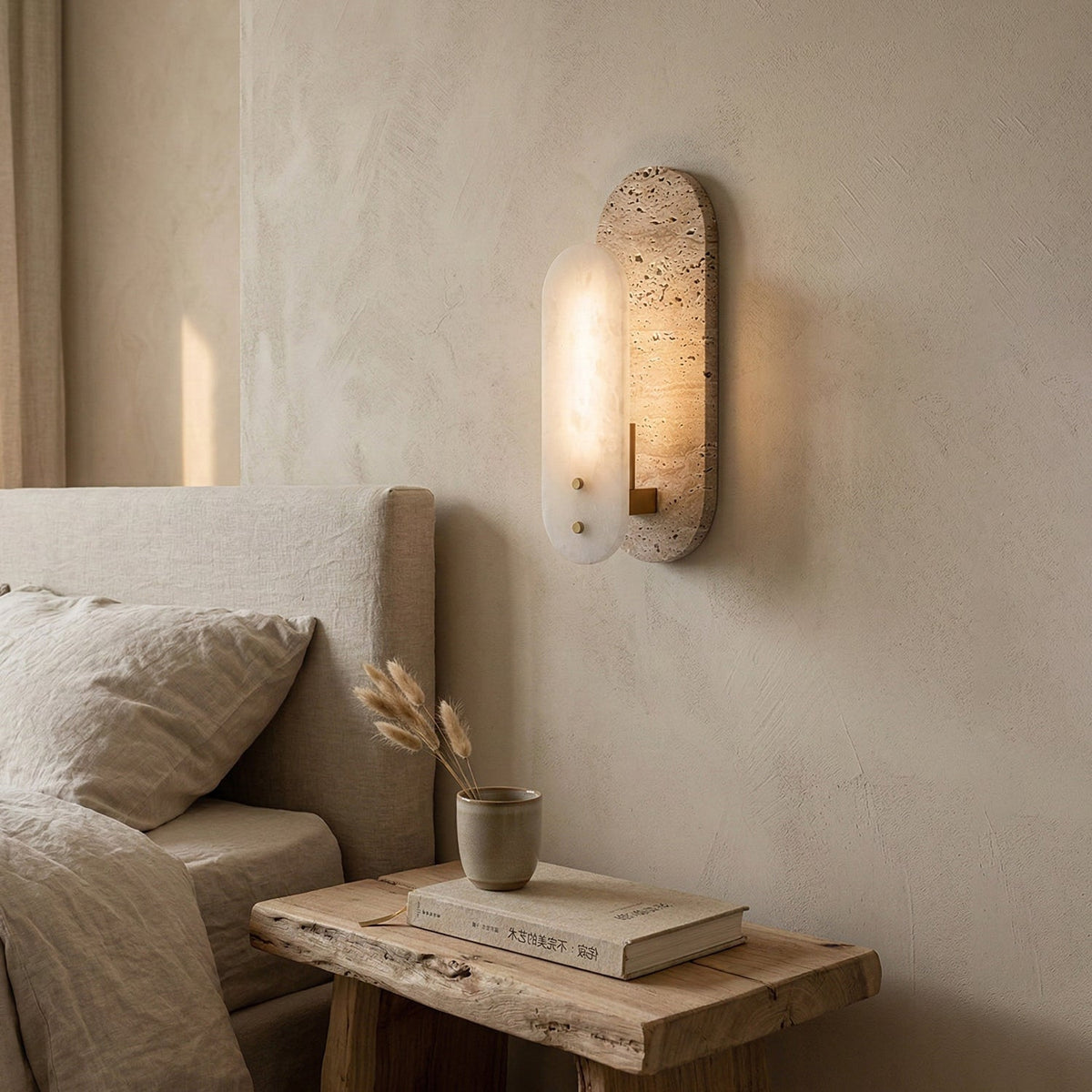 Sigrid Japandi Travertine Wall Light beside a bed