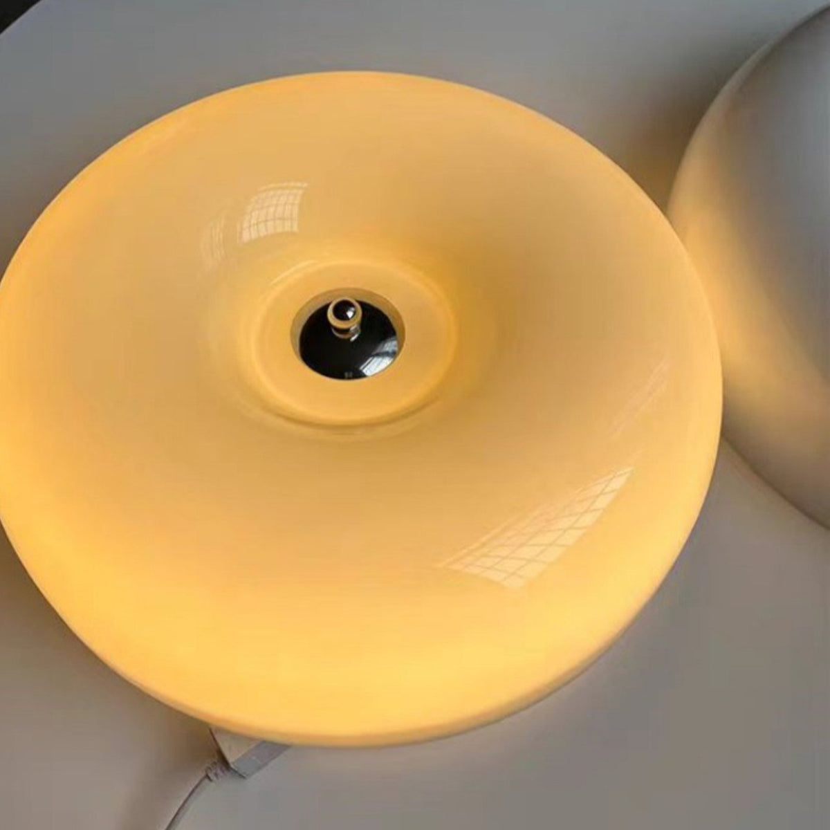 Tsubaki ceiling light glowing warm white