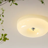 Tsubaki ceiling light with greenery