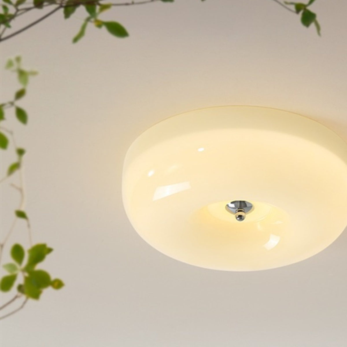 Tsubaki ceiling light with greenery