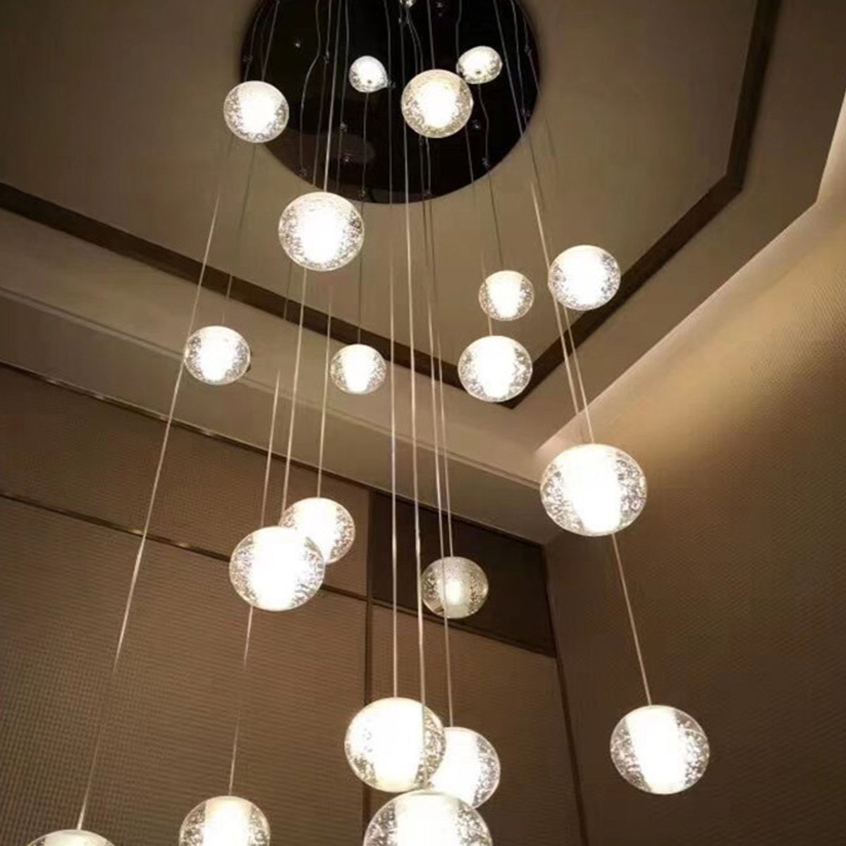 Nimbus chandelier in a double height ceiling
