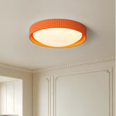 Hida terracotta ceiling light in a panelled bedroom
