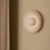Himawari wall light beside a doorway