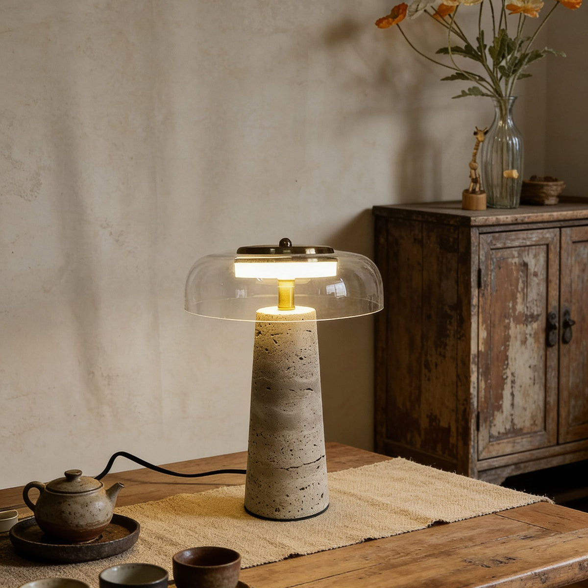 Real photo of Hotaru lamp with clear glass on a wooden table