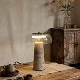 Real photo of Hotaru lamp with clear glass on a wooden table