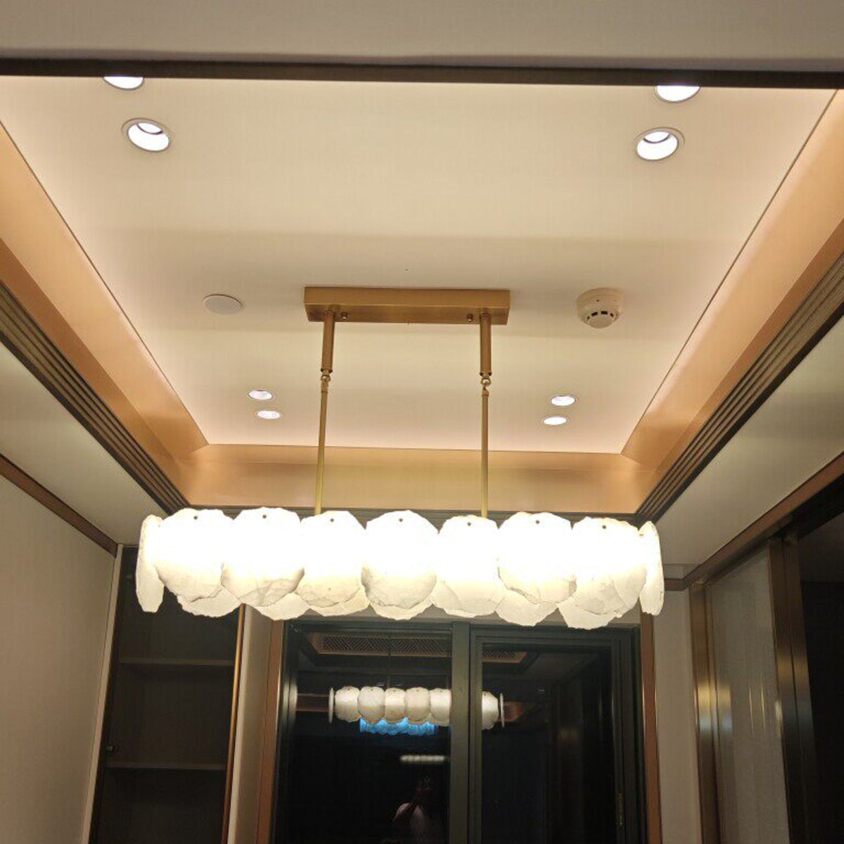 Customer photo of the Isola linear alabaster chandelier installed