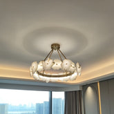 Customer photo of the Isola alabaster chandelier in a living room