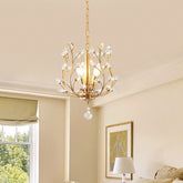 Ivy gold crystal pendant in a sitting room