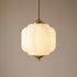Kabocha milk glass pumpkin pendant light 25 cm, lit, warm glow