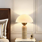 Kinoko lamp on a bedside table