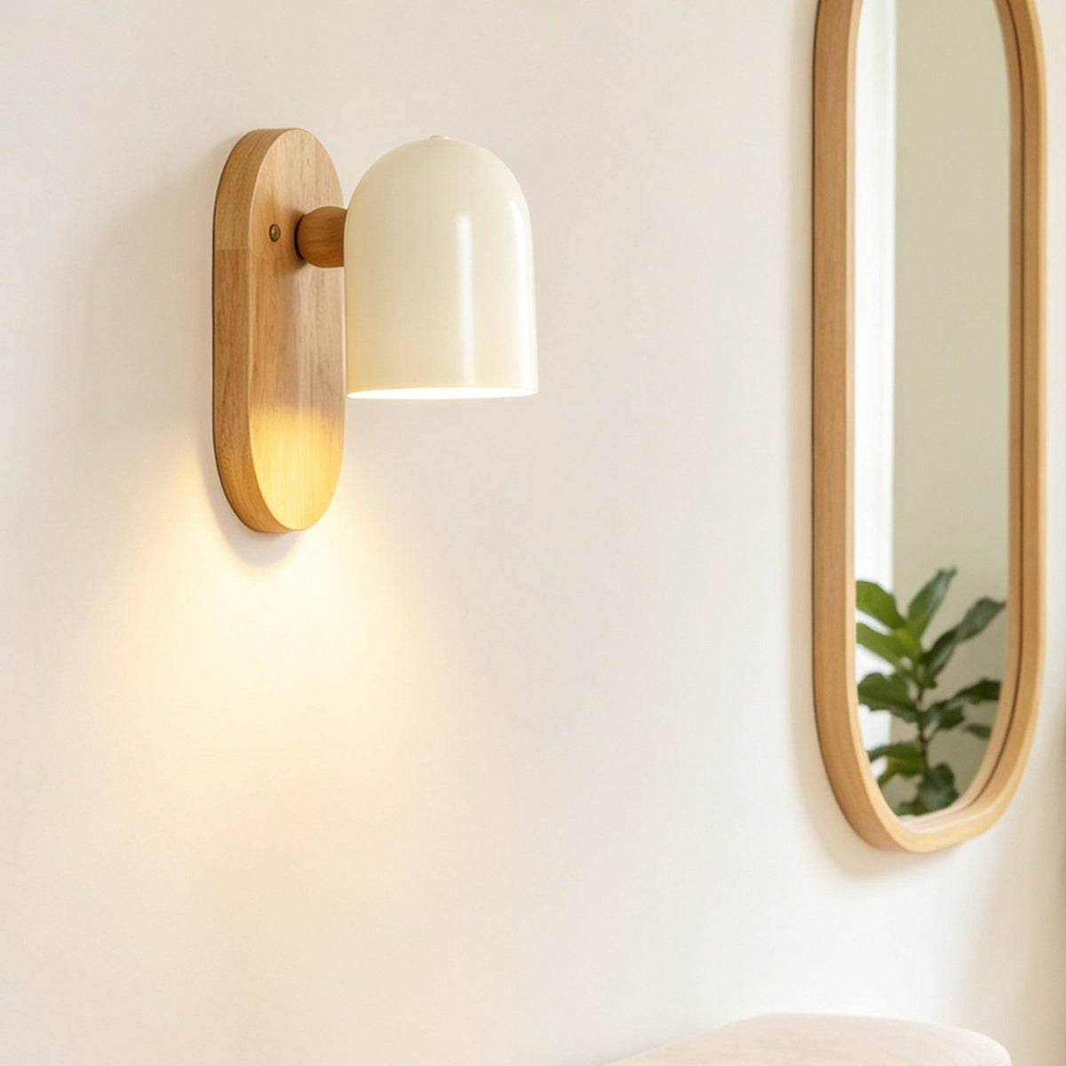 Kodama wall light beside a mirror