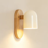Kodama wall light glowing on a wall