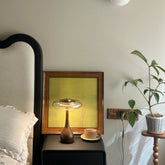 Kohaku lamp on a bedside table at home