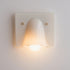 Linnea cream single head wall light glowing warm