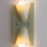 Linnea sage green double head wall light glowing warm
