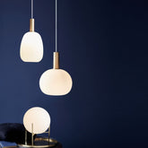 Selma opal glass pendants grouped together