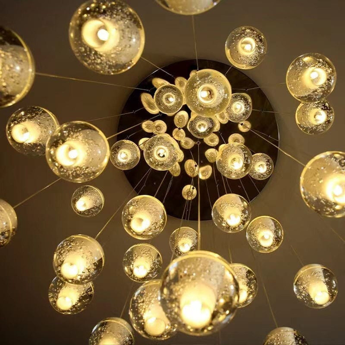 Nimbus glass spheres glowing, seen from below