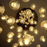 Nimbus glass spheres glowing, seen from below