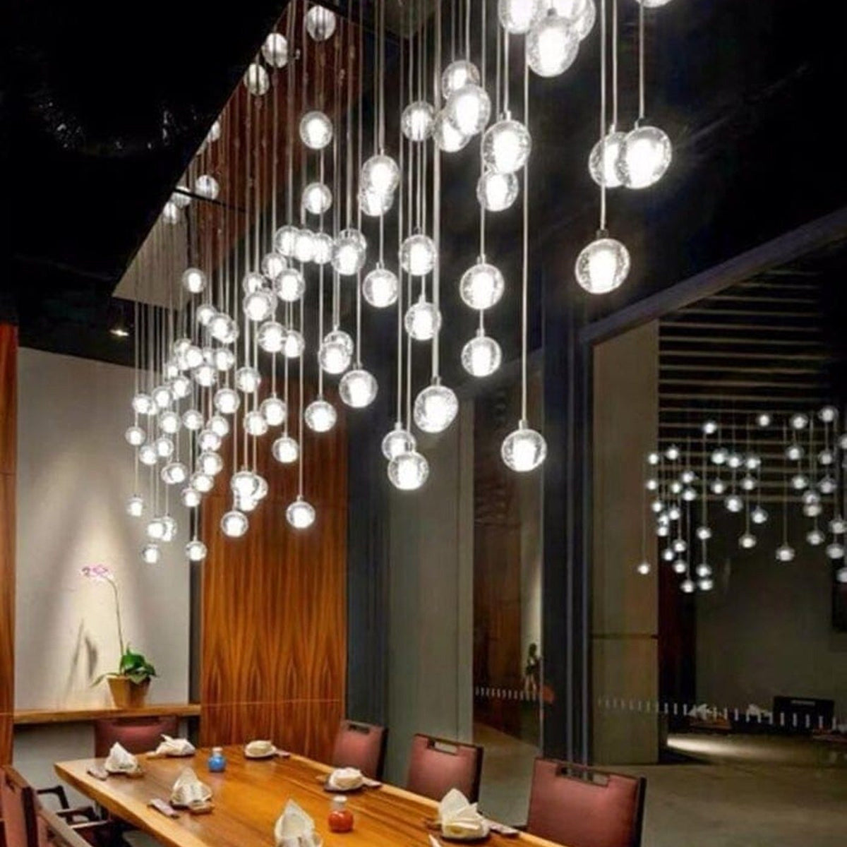 Nimbus chandelier above a restaurant dining table