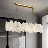 Isola linear alabaster chandelier by a window