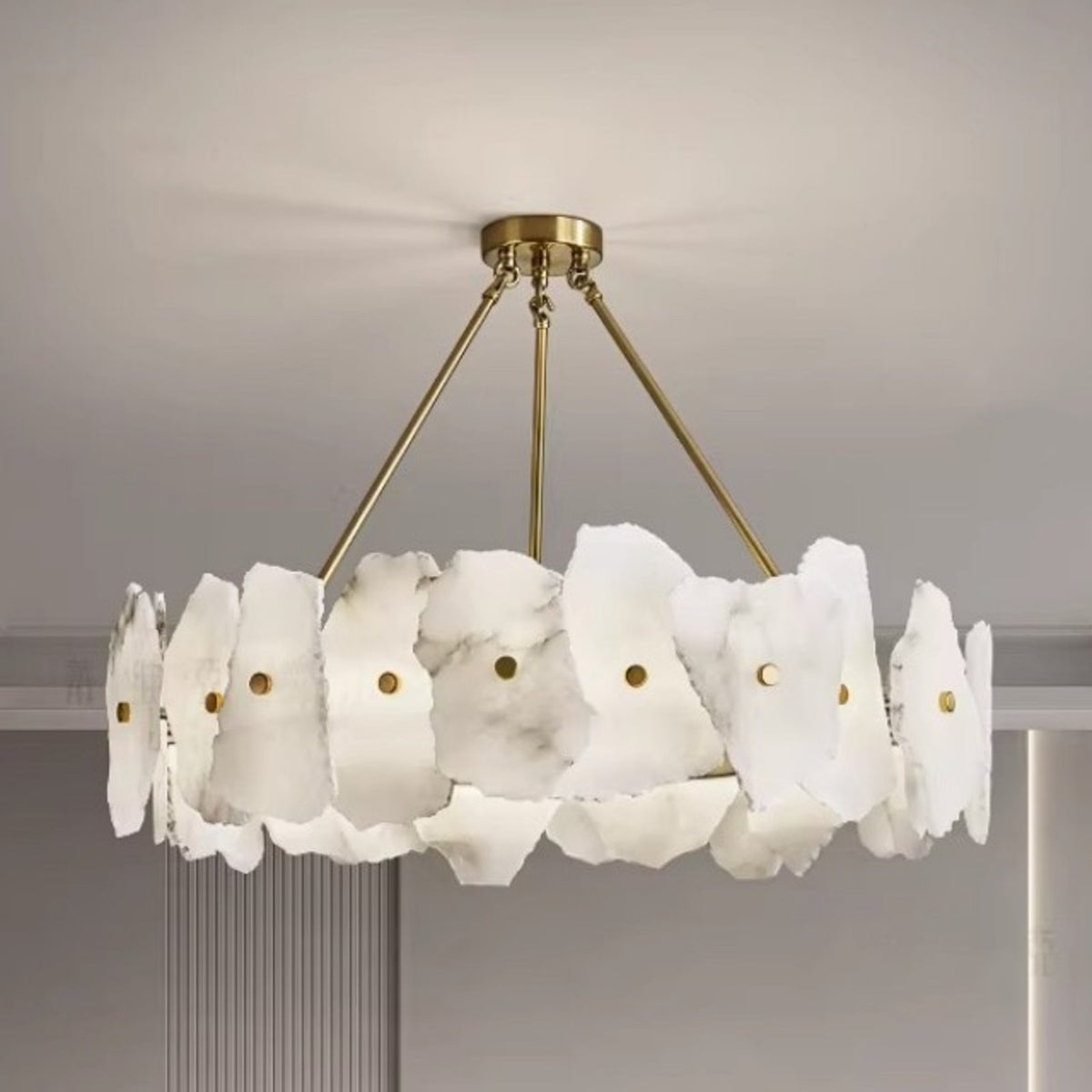 Isola round alabaster chandelier lit
