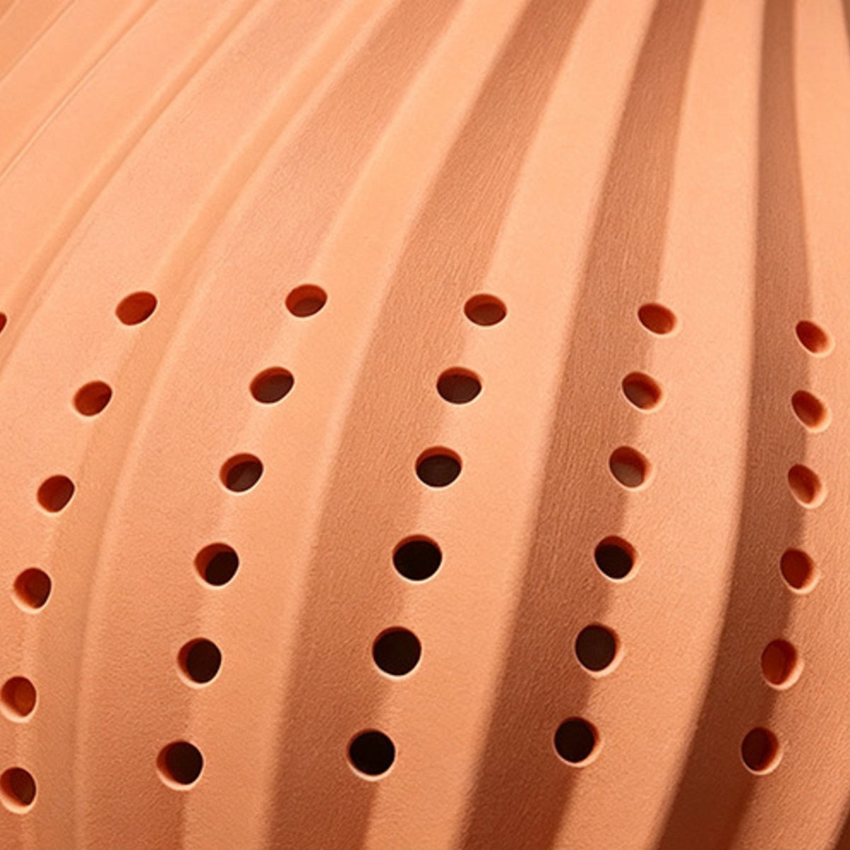 Swirled terracotta ribs and perforations