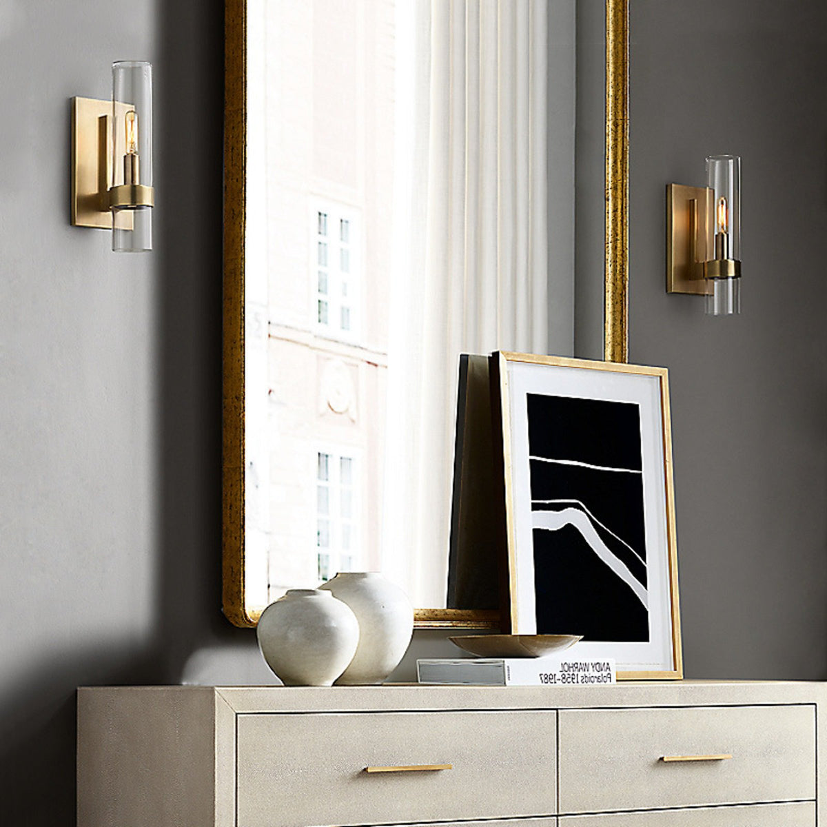 Pair of Tessa wall lights above a sideboard