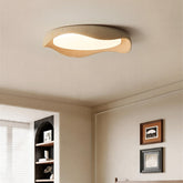 Nami ceiling light above an arched bookcase