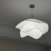 Radiance of Serenity wavy fabric pendant light installed on a ceiling