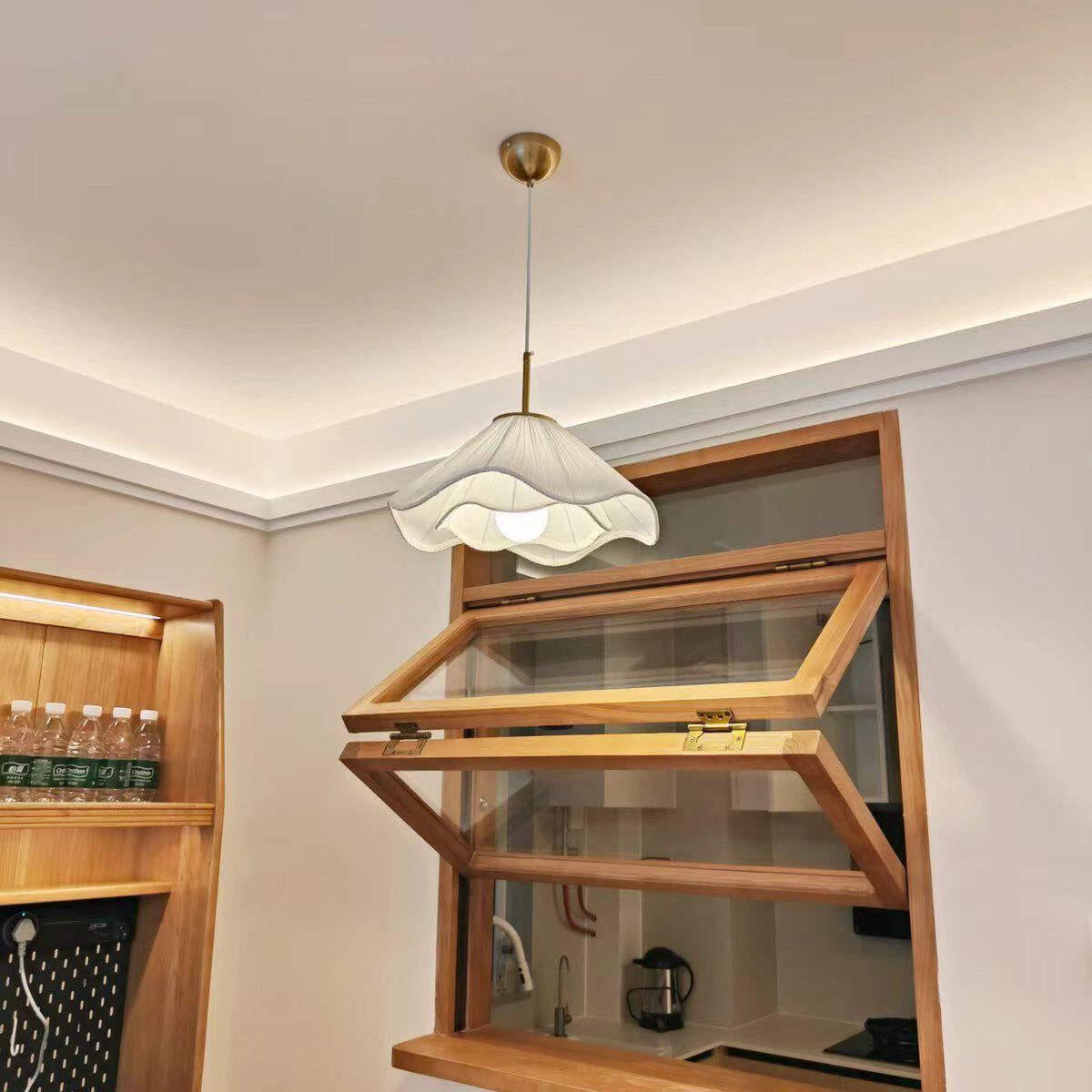Radiance of Serenity wavy fabric pendant light in a bright kitchen